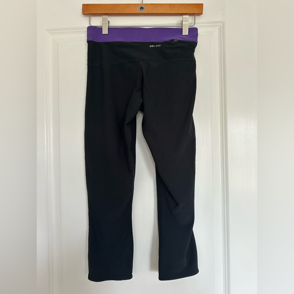Nike Women’s Capri Leggings in Black with Purple Accents - Picture 2 of 4